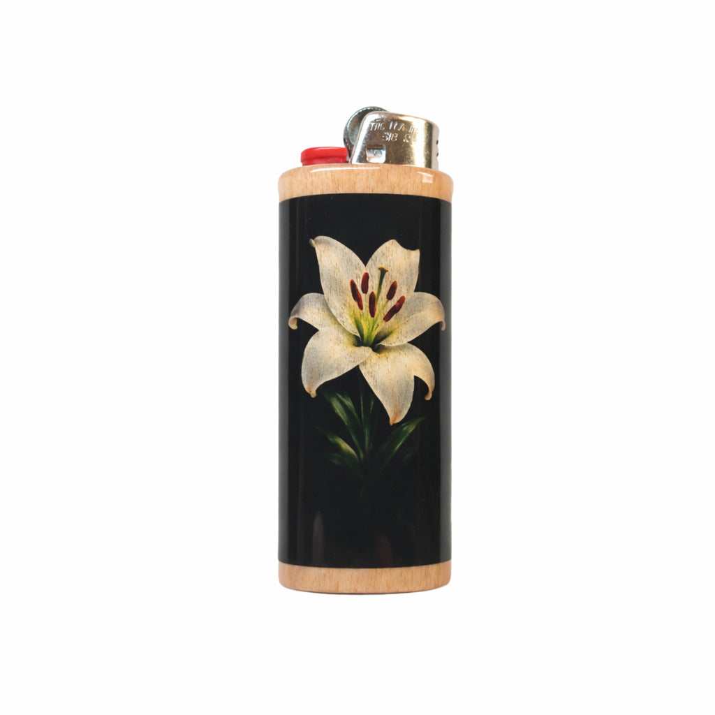Lighter with a white lily design on a black background